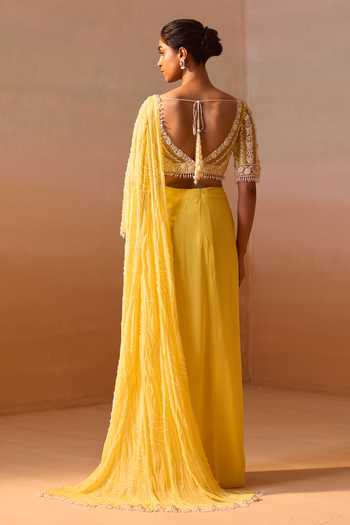 Shop_Nitika Gujral_Yellow Georgette, Net V-neck Pre-draped Saree With Blouse _at_Aza_Fashions