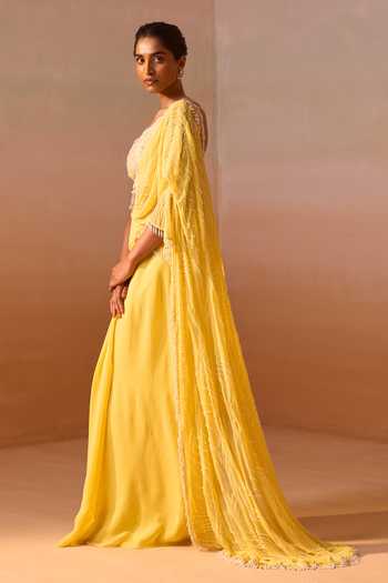 Buy_Nitika Gujral_Yellow Georgette, Net V-neck Pre-draped Saree With Blouse _Online_at_Aza_Fashions