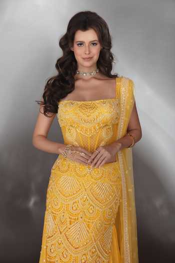 Shop_Saaj By Ankita_Yellow Georgette Pearls, Crystals Bandeau Neck Embroidered Corset Lehenga Set _Online_at_Aza_Fashions