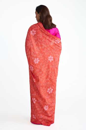 Shop_Naina Jain_Peach Silk Floral Bandhani Saree With Unstitched Blouse Piece _at_Aza_Fashions