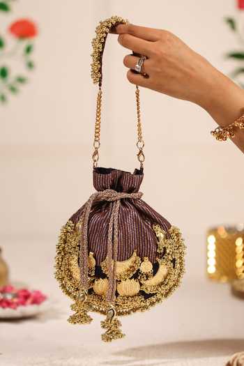 Buy_5elements_Black Beads, Zari, Tassels, Chains Swarna Lalika Cresent Moon Embellished Potli _at_Aza_Fashions