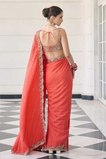 Shop_Awigna_Orange Net, Chiffon V-neck Cosmos Embroidered Border Saree And Blouse Set _at_Aza_Fashions