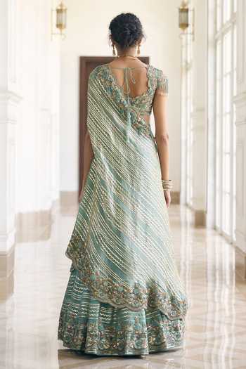Shop_Awigna_Teal Silk, Organza Sweetheart Neck Caladium Diagonal Striped Lehenga Set _at_Aza_Fashions