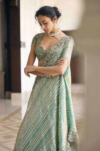 Awigna_Teal Silk, Organza Sweetheart Neck Caladium Diagonal Striped Lehenga Set _Online_at_Aza_Fashions