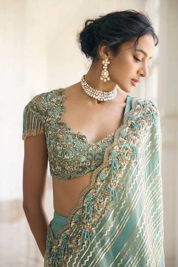 Shop_Awigna_Teal Silk, Organza Sweetheart Neck Caladium Diagonal Striped Lehenga Set _Online_at_Aza_Fashions