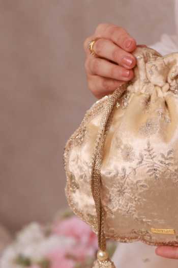 Buy_Amyra_Off White Embroidery, Beads, Pearls, Zari, Tassels Suki Velvet Scallop Potli _Online_at_Aza_Fashions
