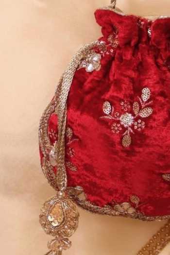 Shop_AMYRA_Red Embroidery, Sequins, Tassels Ras Velvet Scallop Potli _at_Aza_Fashions