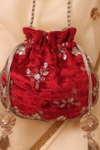 AMYRA_Red Embroidery, Sequins, Tassels Ras Velvet Scallop Potli _at_Aza_Fashions