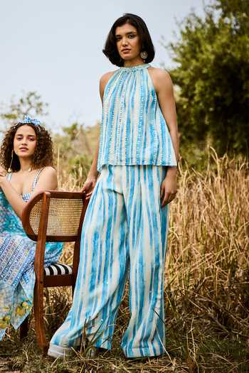 Shop_Basil Leaf_Blue Linen Halter Neck Striped Top And Pant Set _Online_at_Aza_Fashions