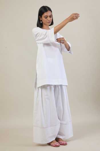Tuli_White Cotton Round Neck Roop Thread Work Kurta And Salwar Set _at_Aza_Fashions