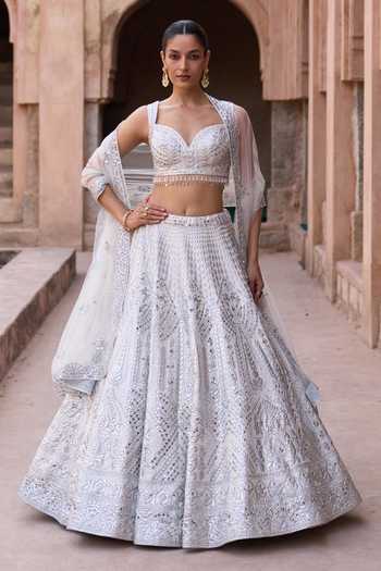 Buy_ANGAD SINGH_Ivory Silk Sweetheart Neck Chaandni Raw Embroidered Lehenga Set _at_Aza_Fashions