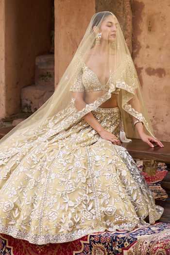 ANGAD SINGH_Gold Net V-neck Basant Floral Embroidered Lehenga Set _Online