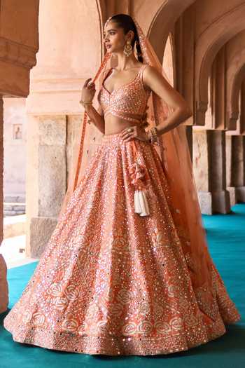 ANGAD SINGH_Orange Silk Sweetheart Neck Suraj Mirror Embroidered Raw Lehenga Set _Online