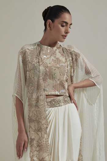 Kavita Bhartia_Ivory Georgette, Crepe, Net, Lurex Round Neck Hand Embellished Cape Skirt Set _at_Aza_Fashions