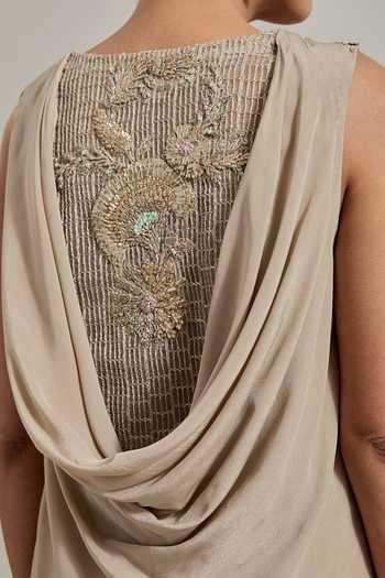 Kavita Bhartia_Gold Crepe, Satin V-neck Asymmetric Top And Skirt Set _at_Aza_Fashions