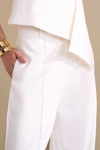 Shop_Naintara Bajaj_Ivory Lycra V-neck Structured Waistcoat And Trouser Set _at_Aza_Fashions