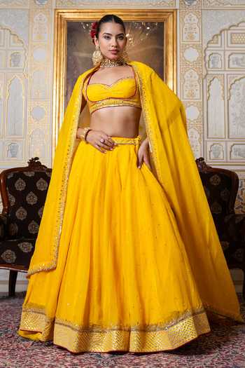 Buy_Pomcha Jaipur_Yellow Organza Sweetheart Neck Mehfil Marigold Sequin Zari Hand Work Lehenga Set _at_Aza_Fashions