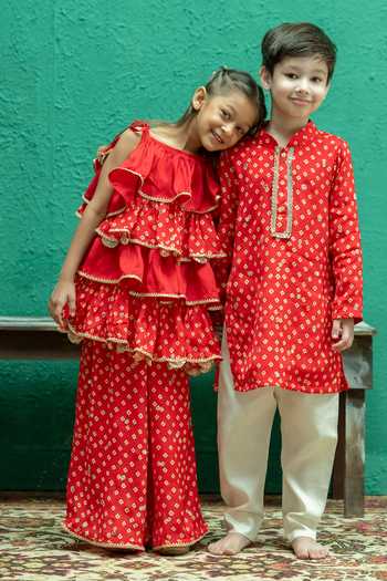 Rage Attire-Sweta Saria_Red Chinon Bandhani Sharara And Tiered Top Set _at_Aza_Fashions