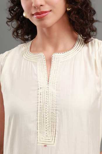 Shop_Kyra By Bhavna_Ivory Chanderi, Cambric Split V-neck, Yes Eira Sleeveless Kurta And Pant Set _Online_at_Aza_Fashions