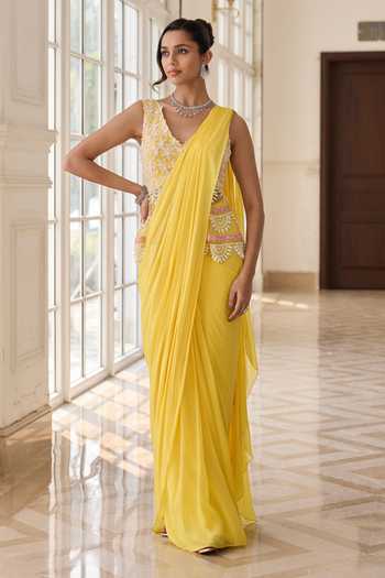 Buy_RINESSA_Yellow Georgette, Net, Shantoon V-neck Embroidered Peplum Top And Saree Set _at_Aza_Fashions