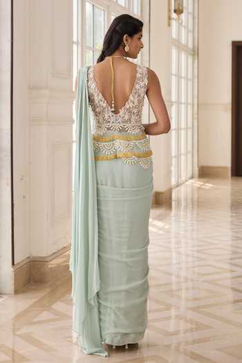 Shop_RINESSA_Mint Georgette, Net, Shantoon V-neck Embroidered Peplum Top And Draped Saree Set _at_Aza_Fashions