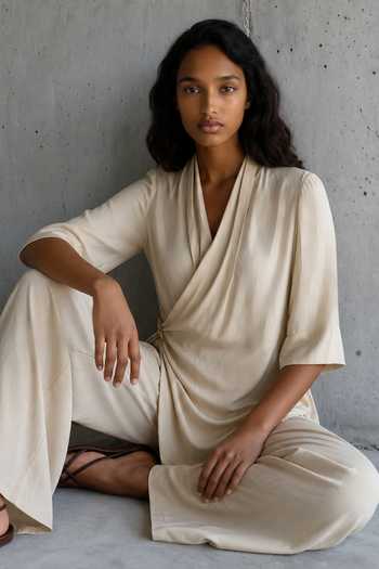 Shop_Vanshika Agarwal Label_Beige Satin V-neck Julia Wrap Top And Trouser Set _Online_at_Aza_Fashions