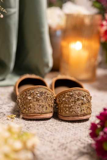 Shop_Coral Haze_Gold Ishreen Hand Embroidered Juttis _at_Aza_Fashions