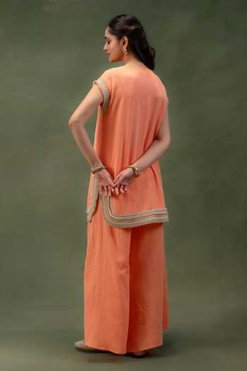 Shop_Grass & Sunshine_Coral Linen Round Neck, Yes Sunset Ease Kurta And Palazzo Set _at_Aza_Fashions