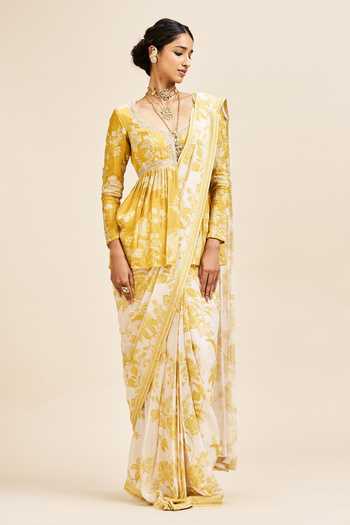 Issa Studio By Chetana & Swathi_Ivory Georgette V-neck Nihari Pre-draped Saree With Peplum Top _Online_at_Aza_Fashions