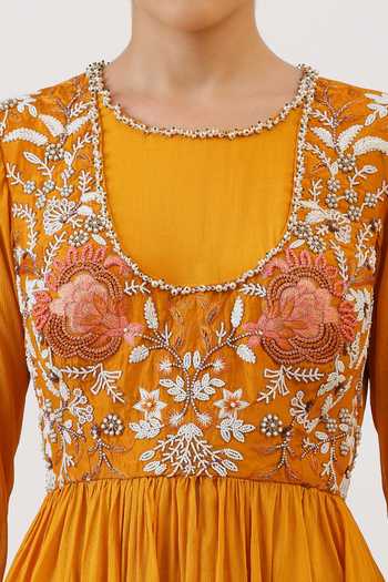 Vidushi Gupta_Mustard Silk, Cotton, Modal Scoop Floral Embroidered Peplum Kurta And Pant Set _at_Aza_Fashions
