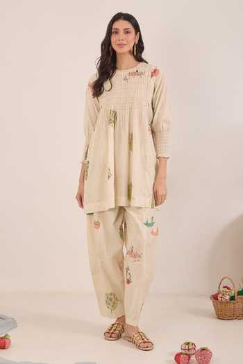 Buy_Shivani Bhargava_Cream Cotton Round Neck, Yes Gulposh Smocking Kurta And Pant Set _at_Aza_Fashions