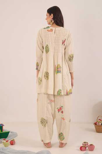 Shop_Shivani Bhargava_Cream Cotton Round Neck, Yes Gulposh Smocking Kurta And Pant Set _at_Aza_Fashions