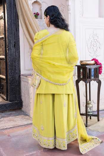 Shop_Tarrz_Lime Crepe Embroidery, Pearls, Zari V-neck Placed Kurta Set _at_Aza_Fashions