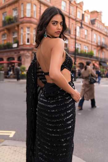 Seema Gujral_Black Georgette, Net Halter Neck Sequin And Crystal Embroidered Saree With Blouse _Online_at_Aza_Fashions