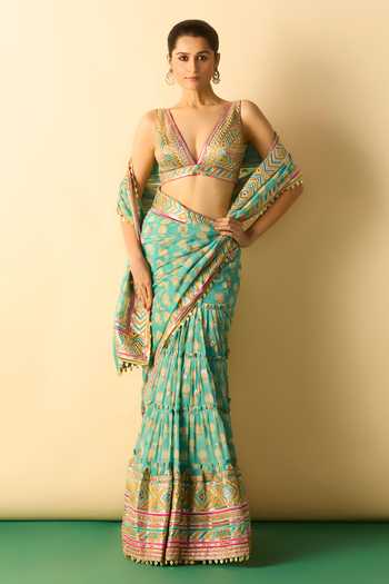 Gopi Vaid_Aqua Georgette V-neck Jasleen Print Tiered Saree With Blouse _Online_at_Aza_Fashions