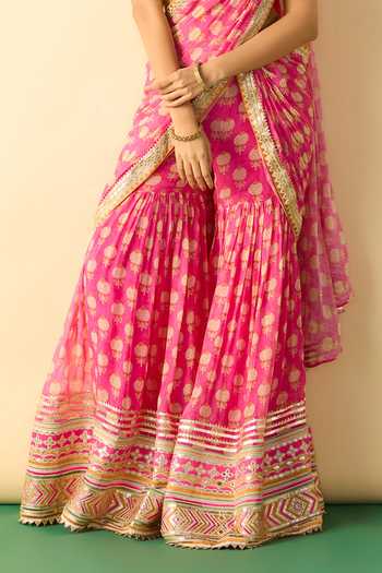 Gopi Vaid_Pink Georgette Halter Neck Labdhi Print Draped Sharara Saree With Blouse _at_Aza_Fashions