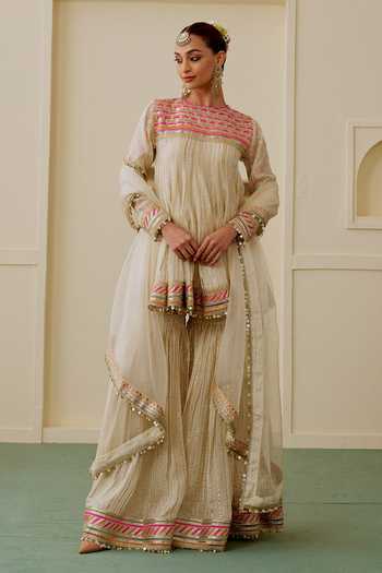 Buy_Gopi Vaid_Beige Organza, Net, Viscose Round Neck Malak Short Peplum Kurta Sharara Set _at_Aza_Fashions