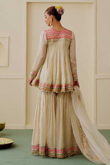 Shop_Gopi Vaid_Beige Organza, Net, Viscose Round Neck Malak Short Peplum Kurta Sharara Set _at_Aza_Fashions