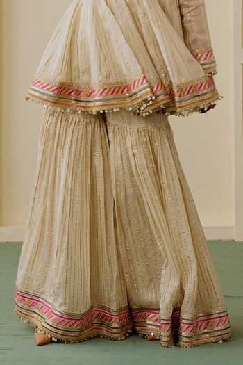 Buy_Gopi Vaid_Beige Organza, Net, Viscose Round Neck Malak Short Peplum Kurta Sharara Set _Online_at_Aza_Fashions