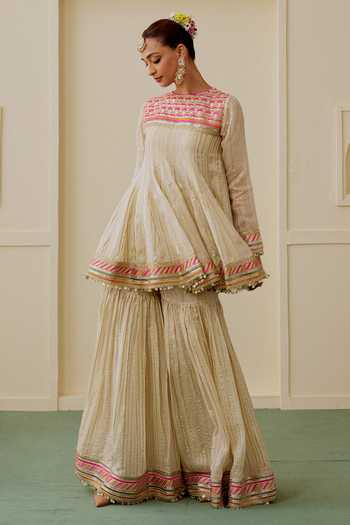 Gopi Vaid_Beige Organza, Net, Viscose Round Neck Malak Short Peplum Kurta Sharara Set _at_Aza_Fashions