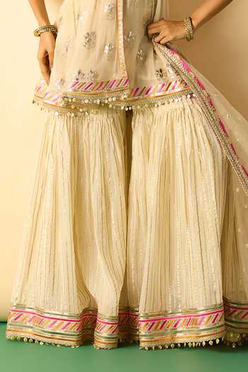 Gopi Vaid_Beige Georgette, Organza, Viscose, Net Halter Myza Peplum Tunic Sharara Set _Online_at_Aza_Fashions