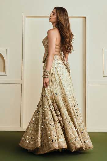 Gopi Vaid_Beige Net, Tissue Halter Neck Saanjh Mirror Embroidered Lehenga Set _Online_at_Aza_Fashions