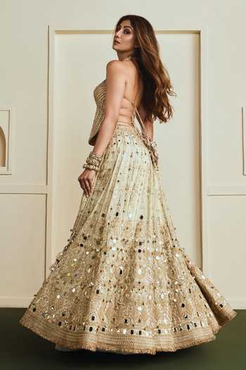 Shop_Gopi Vaid_Beige Net, Tissue Halter Neck Saanjh Mirror Embroidered Lehenga Set _at_Aza_Fashions