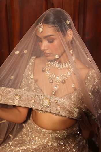 Shop_Devkalii_Gold Net Sweetheart Neck Hand Embroidered Lehenga Set _Online_at_Aza_Fashions