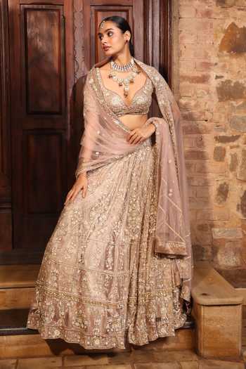 Buy_Devkalii_Gold Net Sweetheart Neck Hand Embroidered Lehenga Set _at_Aza_Fashions