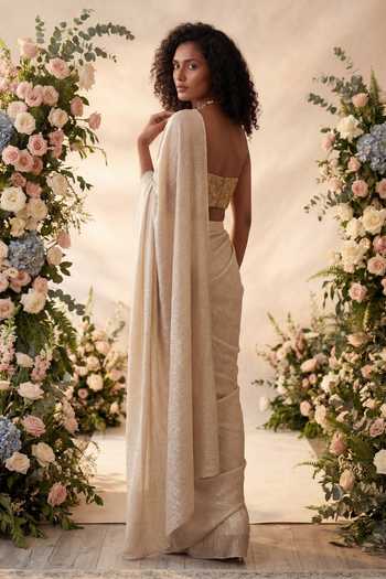 Shop_Devkalii_Rose Gold Crepe Sweetheart Neck Texture Pre-draped Saree With Blouse _at_Aza_Fashions