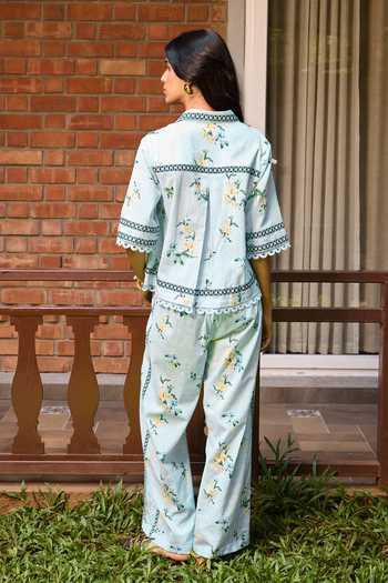 Shop_Needleten_Blue Linen Ciel Floral Print Pant _at_Aza_Fashions