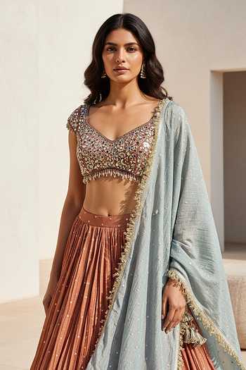 Basanti Kapde aur Koffee_Orange Tissue Sweetheart Neck Russet Embroidered Lehenga Set _at_Aza_Fashions