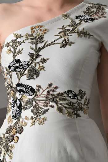 Samant Chauhan_Ivory Silk, Cotton Embroidery, Zari One Shoulder Sculpted Gown _Online_at_Aza_Fashions