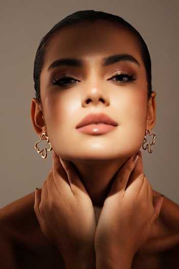 Shop_Varnika Arora_Gold Plated Flutter Hoop Earrings _at_Aza_Fashions